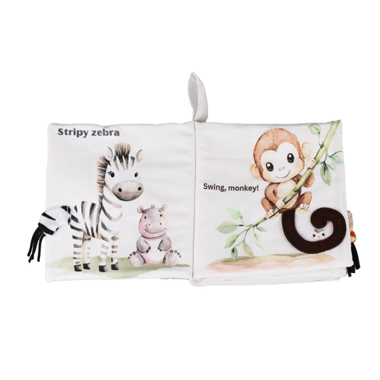 Children's soft book with animal illustrations on a white background