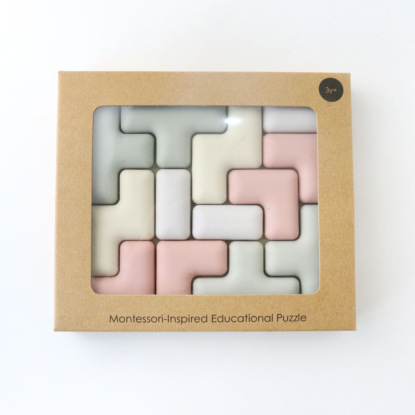 Montessori-inspired educational puzzle in a cardboard box on a white background