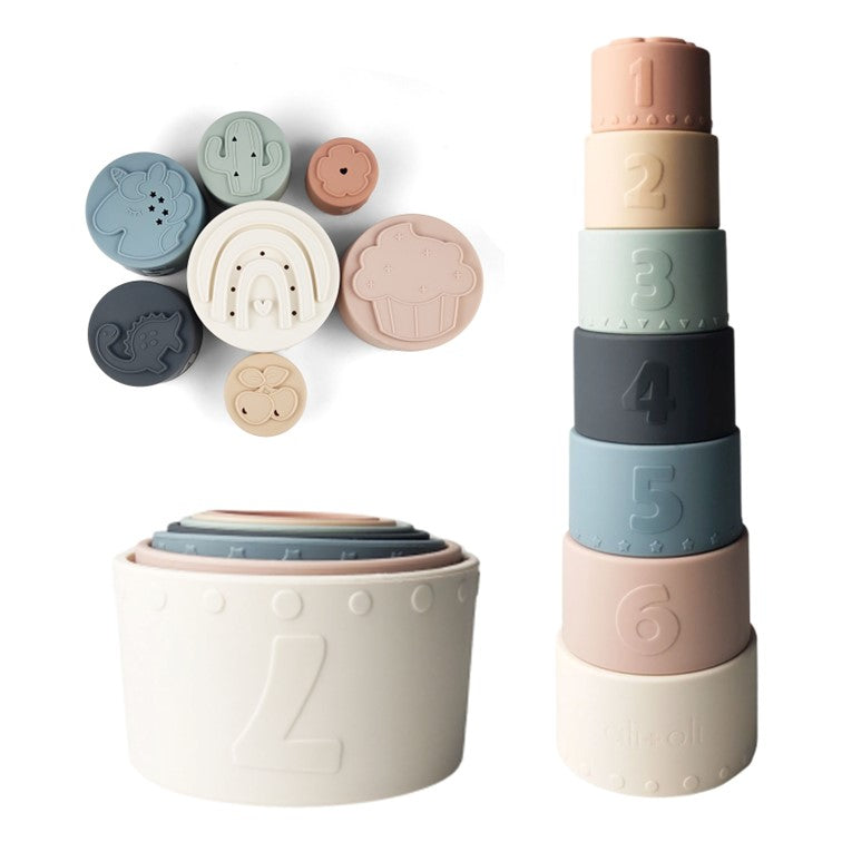 A set of large soft silicone stacking cups in various pastel colors, with shapes cut into the bottom, displayed both stacked and separated with their corresponding shape toys.