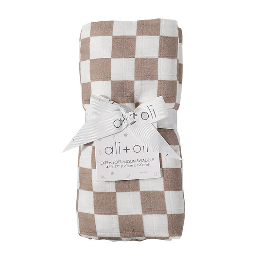 Checkered muslin swaddle with ali+oli label on a white background