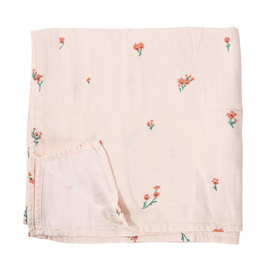 Floral patterned blanket on a white background