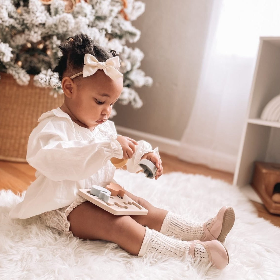 Baby Girl Playing with Animal Puzzle