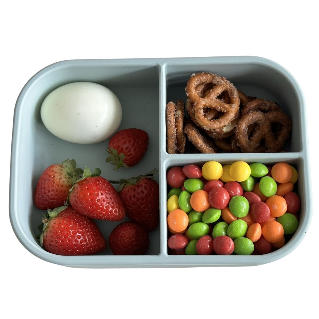 The bento box is leak-proof and has compartments to help parents pack a balanced and nutritious lunch for their children.
